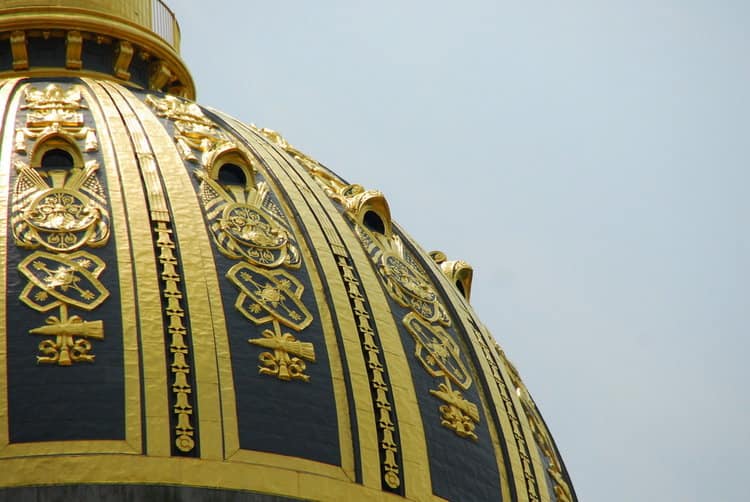 Close-up view of the West Virginia Capitol dome and its intricately detailed exterior gilding.
