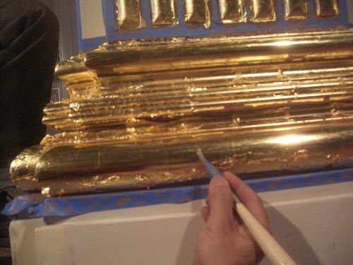 Burnishing of capital base after application of gold in water gilding process